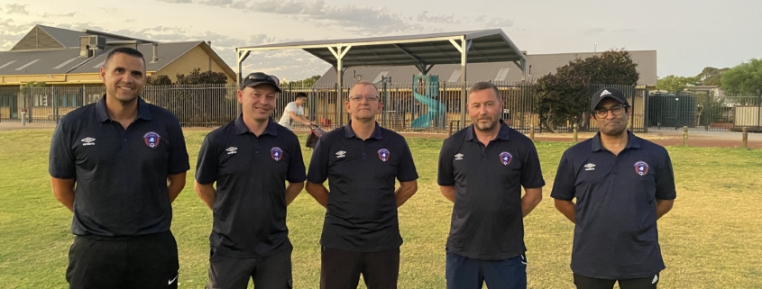 Five men in Alkimos FC polo shirts.